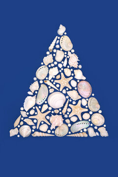 Tree shape design with seashells and oyster pearls on blue background. Seasonal seaside art decoration concept. Greeting card. 
