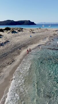 Explore the breathtaking beauty of Simos Beach on Elafonisos Island in Greece. Soft sands and tranquil turquoise waters create a perfect getaway for relaxation and adventure under the sun.
