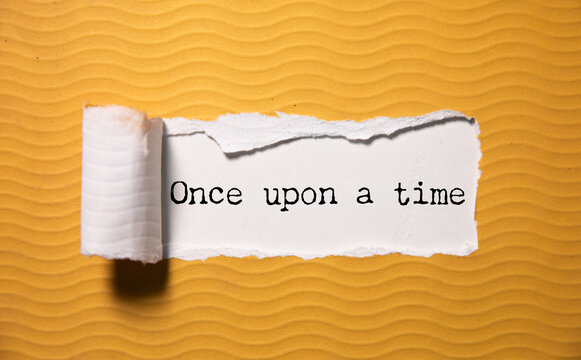 once upon a time, text on white paper