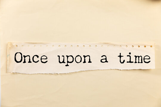 once upon a time, text on white paper