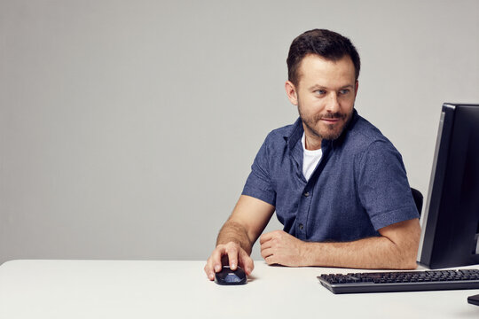 Communications Manager Working at a Clean Desk