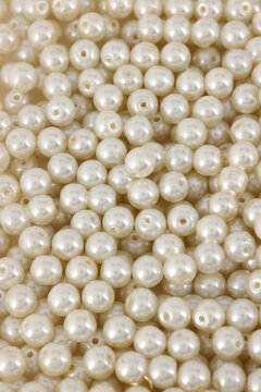 Full frame shot of Small Cream Colour pearl beads.