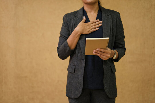 Business Professional Making a Sincere Accountability Pledge