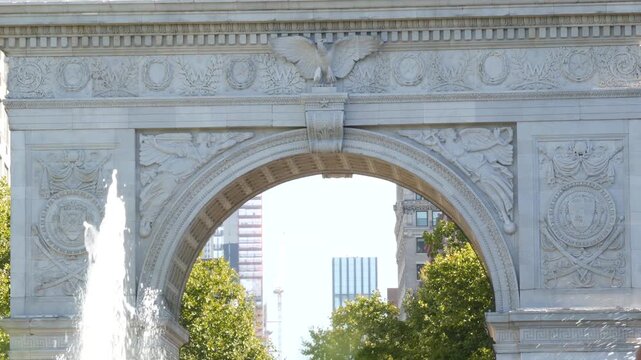 New York City Manhattan Washington Square Park arch, United States. Marble historic monument Greenwich Village. 5 fifth avenue triumphal arch. Autumn fall garden greenery. George Washington memorial.