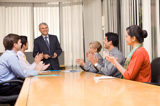 Businessman getting an applause