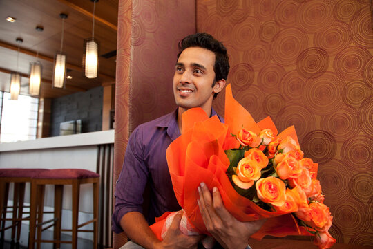 Man with a bouquet of flowers