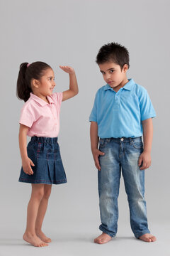 Girl measuring her height