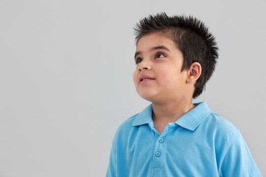 Young boy looking up