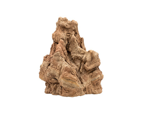 Eroded clay formation against a black background displays textured layers
