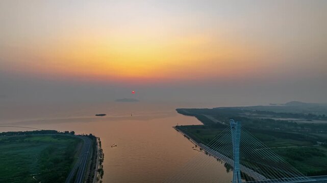 Hefei Feixi Hangbu River Bridge Sunrise Timelapse: Cable-Stayed Span Over Water with Golden Dawn Reflections