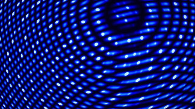 Neon abstract bokeh light grid with warped dot pattern in a seamless 3d loop animation. Glowing blue gradient with soft blur for futuristic motion graphics.