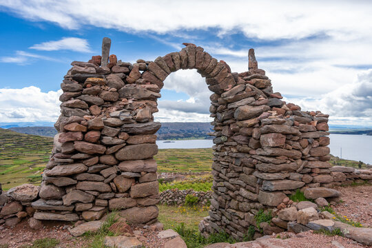 Stone pathway and arch at Pachatata archaeological site, Amantani Island, La ke Titicaca, Peru