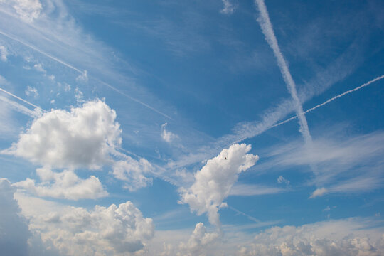 Clouds in a blue sky in bright sunlight in summer, Voeren, Limburg, Belgium, August, 2026