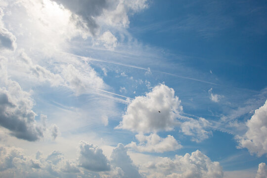 Clouds in a blue sky in bright sunlight in summer, Voeren, Limburg, Belgium, August, 2026
