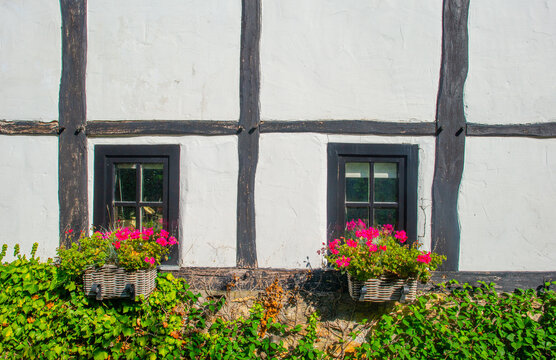 Architecture in sunlight and shadow in green woodland in summer, Voeren, Limburg, Belgium, August, 2026