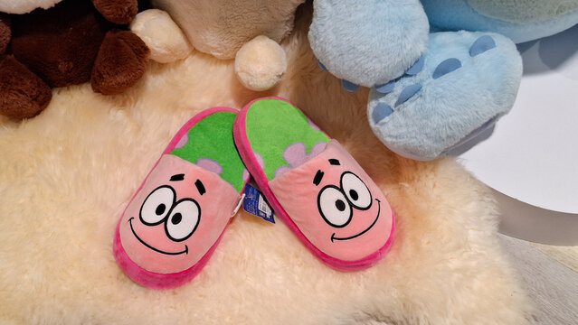 SpongeBob SquarePants Patrick Star plush indoor house slippers placed on soft rug on July 27, 2026 in Bangkok,  Thailand 