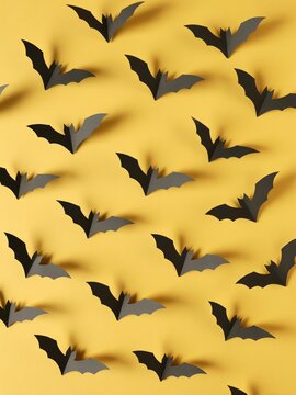Halloween Bat Pattern on Yellow Background