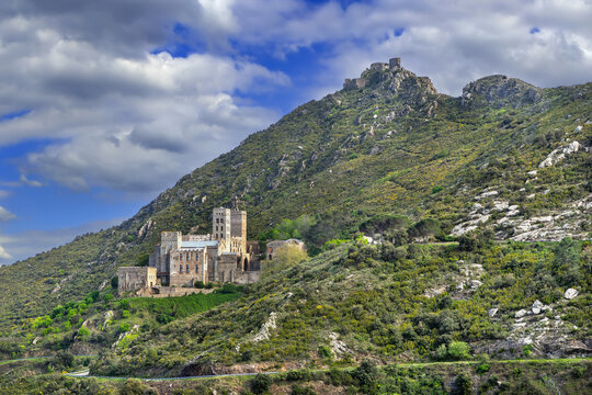 View of Sant Pere de Rodes monastery, mountain and ruins, Catalonia, Spain. High angle scenery, sunny day, historic site