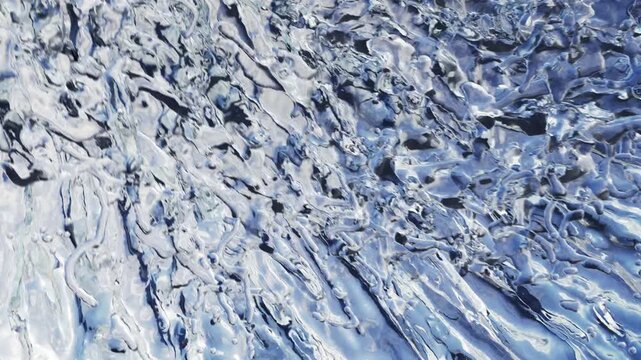Abstract water surface Texture, A close-up, high-angle view of a water formation, revealing intricate patterns of melting and refreezing, showcasing the raw beauty of natural abstract art.