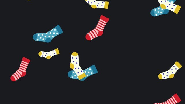 whimsical colorful socks fall down on dark background