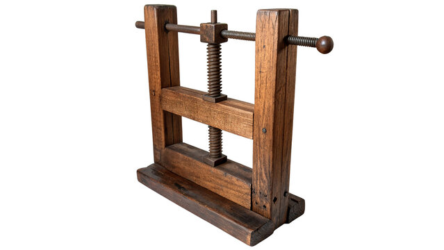 Vintage traditional wooden mechanical press machinery tool isolated on a white background