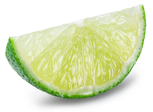 Close-up studio shot of a single juicy crescent-shaped green lime fruit slice wedge, isolated on a white background. Clipping Path.