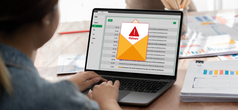 Cyber attacking concept. Malware alert showing on computer screen display scam and threat detection on computer system or online server to be removed brisk.
