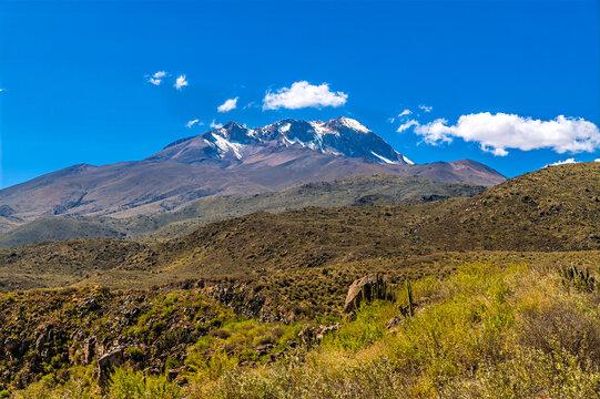 A view towards the Chachani volcano from a Colca Canyon viewpoint in the Andes mountains of Peru in the dry season