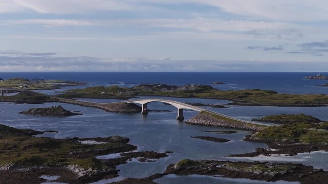Aerial view of Storseisundet Bridge along the Atlantic Ocean Road spanning rocky coastal islands in More og Romsdal, Norway.
