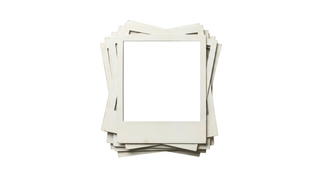 Stack of blank white vintage polaroid photo frames isolated on transparent background
