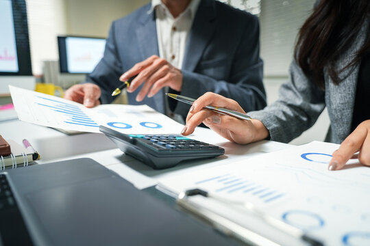 Business Team Analyzing Financial Reports