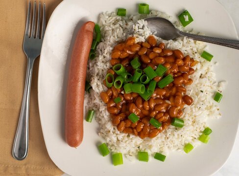 white rice with  baked beans and scallions