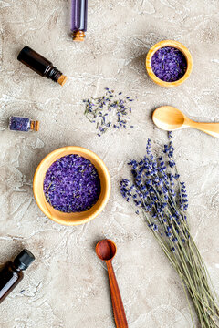 Essential oil and lavender salt with flowers top view