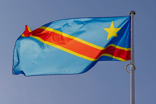 Democratic Republic of Congo Flag at Sunny Day Blue Sky