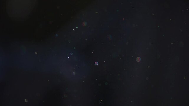 Dust Particles Gently Floating Purple Background, Macro Slow Motion