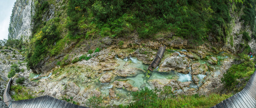 Top down panoramic view of crystal clear turquoise river flowing through Otschergraben (Oetschergraeben) canyon in september, Austria