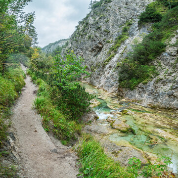 Top down panoramic view of crystal clear turquoise river flowing through Otschergraben (Oetschergraeben) canyon in september, Austria