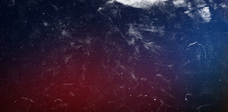 Deep blue and maroon red gradient background with dramatic vintage scratches and fine dust particles perfect for modern web banners and creative conceptual digital artwork.