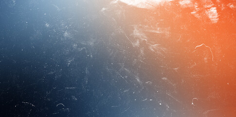 Abstract dusty distressed texture overlay background, striking blue and orange gradient color with white particles for artistic designs and grunge effects. © Design Point