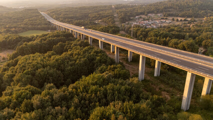 Fototapeta premium Highway viaduct spanning over forest in Ourense, Galicia