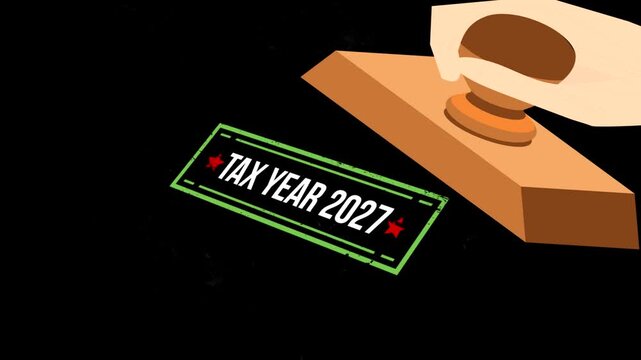 Wooden rubber stamp pressing on a document with the text tax year 2027