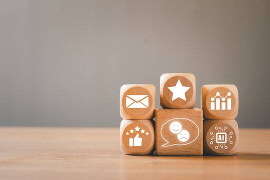 AI-Driven Customer Sentiment Analysis Concept with Digital Icons on Wooden Blocks for Business Insights