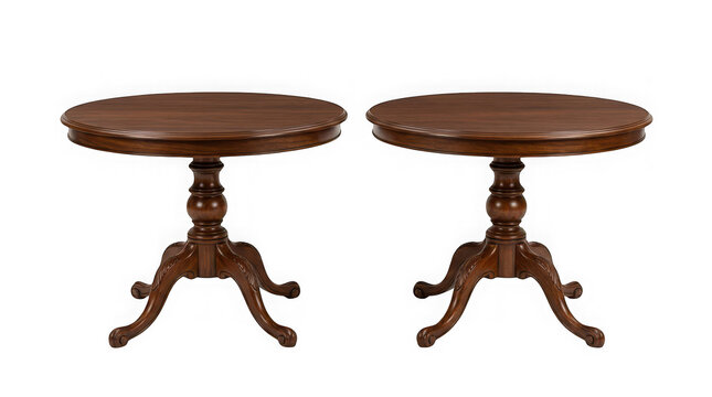 Two classic round wooden side tables with carved pedestal legs isolated on transparent background