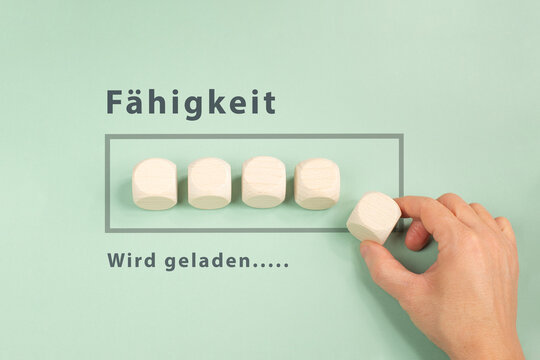 New skill loading progress in german language, upskilling, upgrade knowledge, continuous development, learning skills for career 