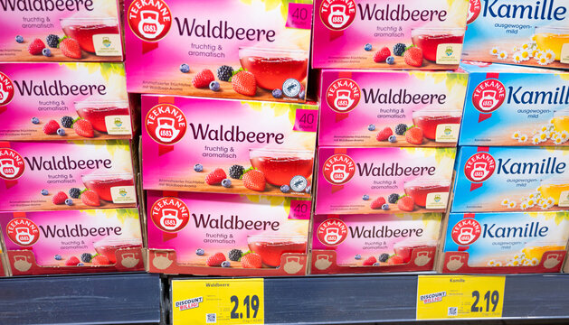 Tea assortment at store shelves, flavoured teas with forest berry fruit mix and chamomile, brand Teekanne, supermarket in Trier, Germany