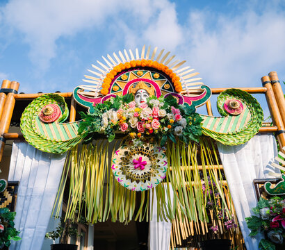 Balinese people wearing traditional attire participating in a sacred Hindu religious ceremony, Bali, Indonesia
