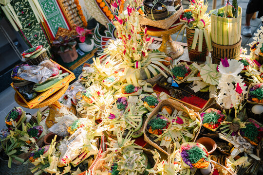 Balinese people wearing traditional attire participating in a sacred Hindu religious ceremony, Bali, Indonesia