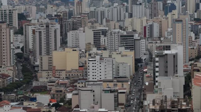 Static Aerial View of Dense City Blocks in Morning Haze