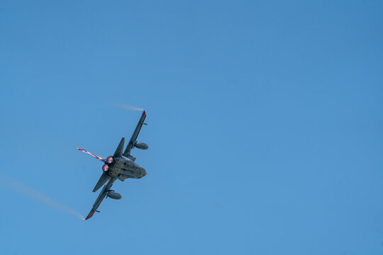 View of a German Air Force Panavia Tornado fighter jet performing a high-speed maneuver against a clear blue sky at the Antidotum Airshow in Leszno, Greater Poland Voivod, Poland.