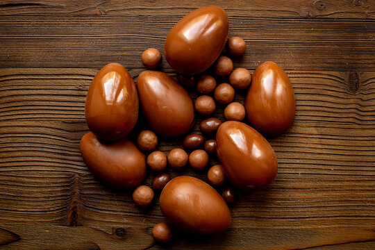Chocolate background - various chocolate eggs and candies, top view